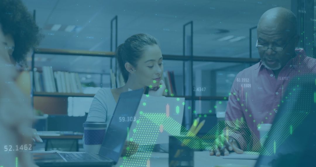 Team Collaborating with Digital Financial Data in Office Environment