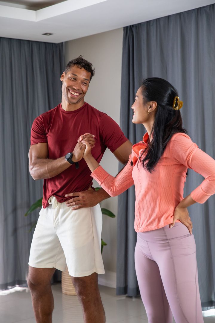 Diverse Dance Partners Practicing in Studio with Lapel Mic