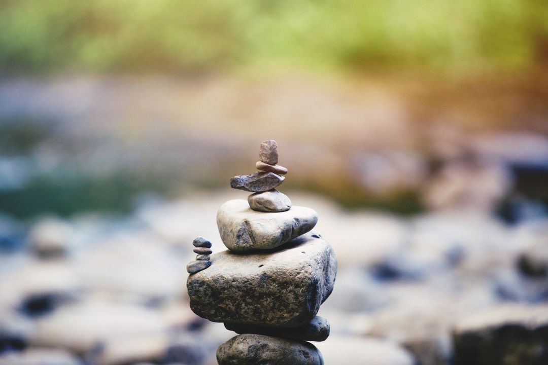 Balanced Stone Pile by Tranquil Riverbed