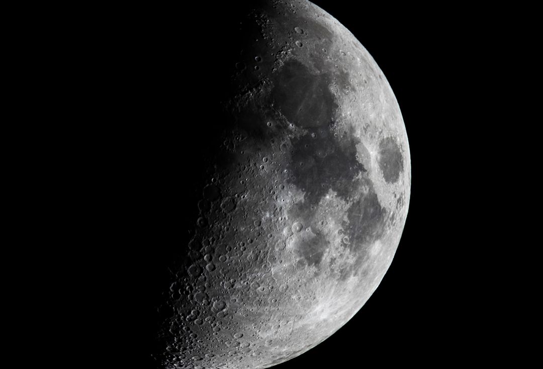Detailed Waxing Crescent Moon Against Dark Sky