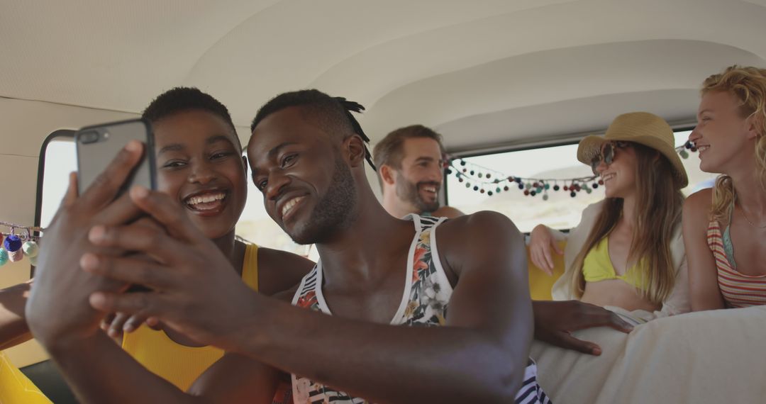 Group of Friends Taking Selfie During Road Trip in Camper Van - Free Images, Stock Photos and Pictures on Pikwizard.com