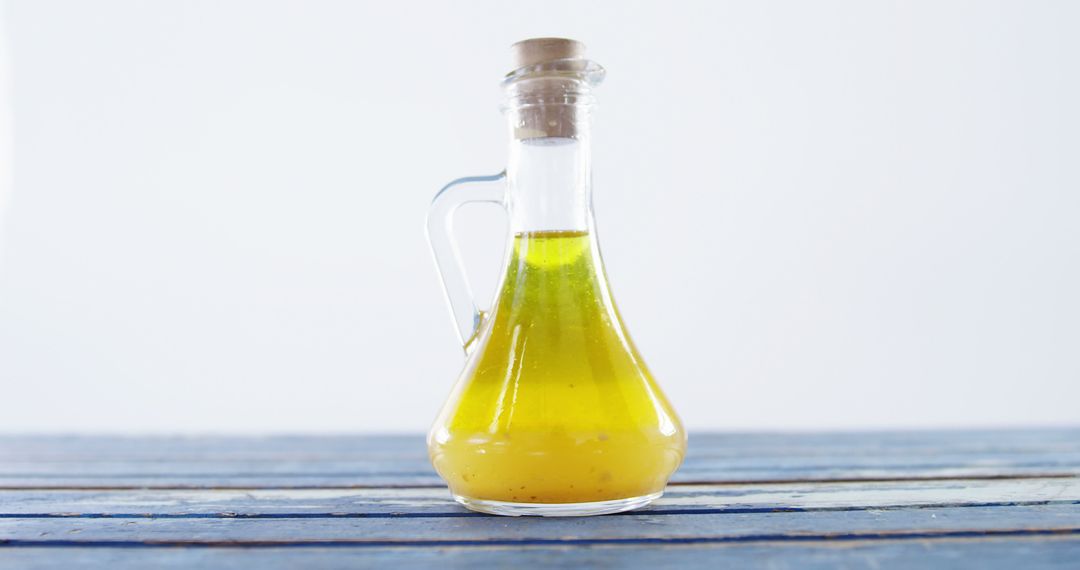 Bottle of Freshly Made Homemade Salad Dressing on Wooden Table - Free Images, Stock Photos and Pictures on Pikwizard.com