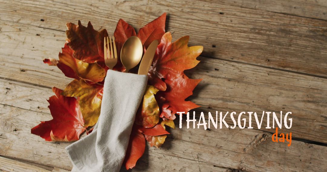 Thanksgiving Celebration Place Setting with Autumn Leaves