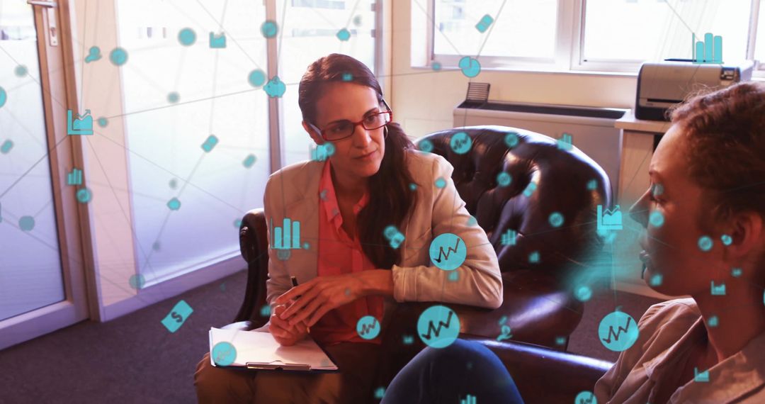 Female Counselor with Digital Graph Icons Discussing Therapy Progress