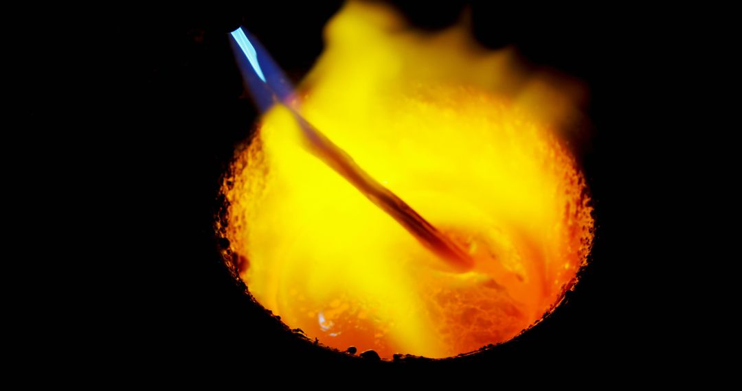 Molten Metal in Crucible with Bright Flame in Foundry - Free Images, Stock Photos and Pictures on Pikwizard.com