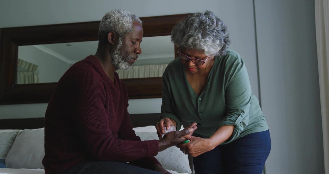 Senior Woman Checking Man's Blood Glucose Level with Care