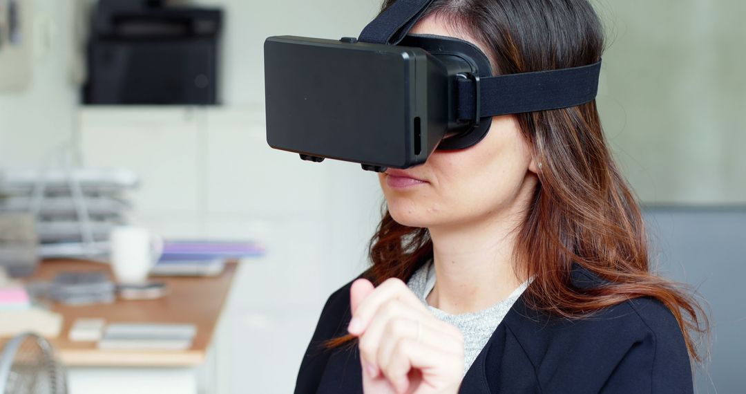 Woman Using Virtual Reality Headset for Immersive Experience - Free Images, Stock Photos and Pictures on Pikwizard.com