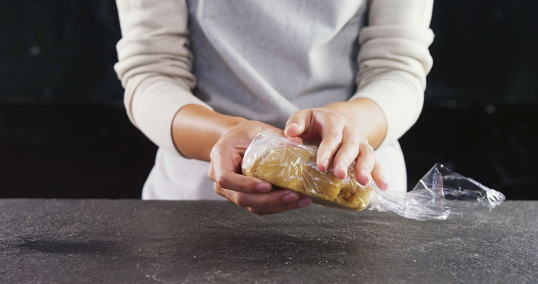 Baker Wrapping Cookie Dough for Refrigeration