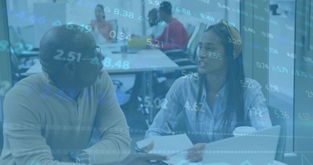 Professionals Discussing Market Trends with Data Overlay in Modern Office