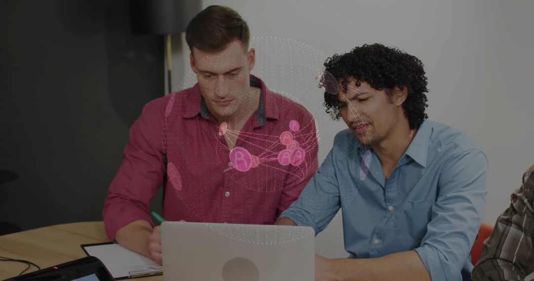 Innovative Business Team Collaborating on Laptop in Modern Office