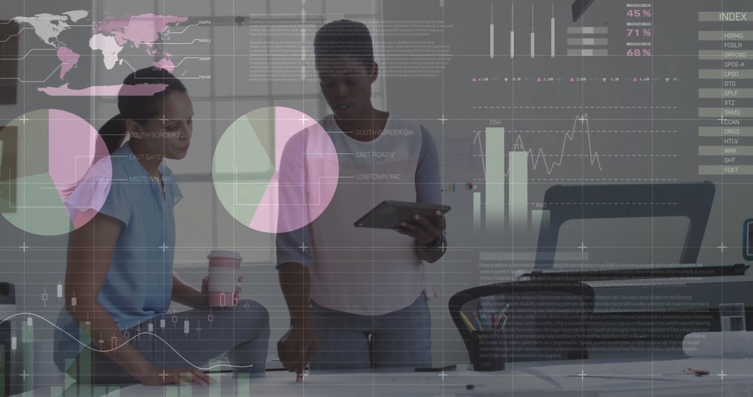 Diverse Businesswomen Analyzing Data with Digital Charts