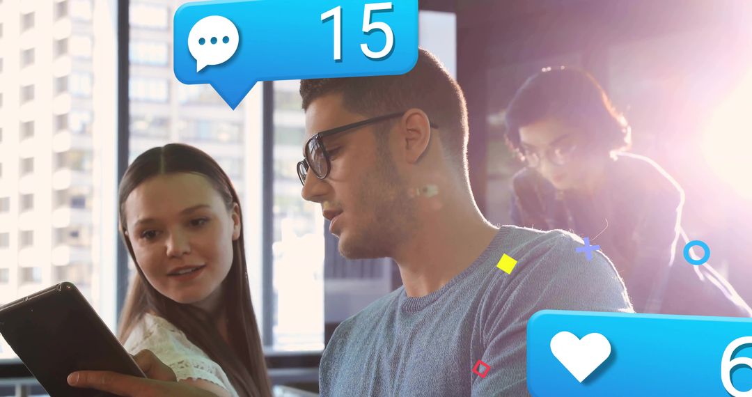 Young Professionals Collaborating on Tablet With Social Media Overlay