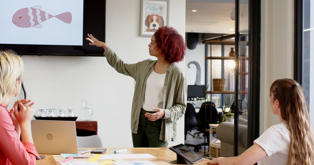 Diverse Coworkers in Modern Office Collaborating via Presentation