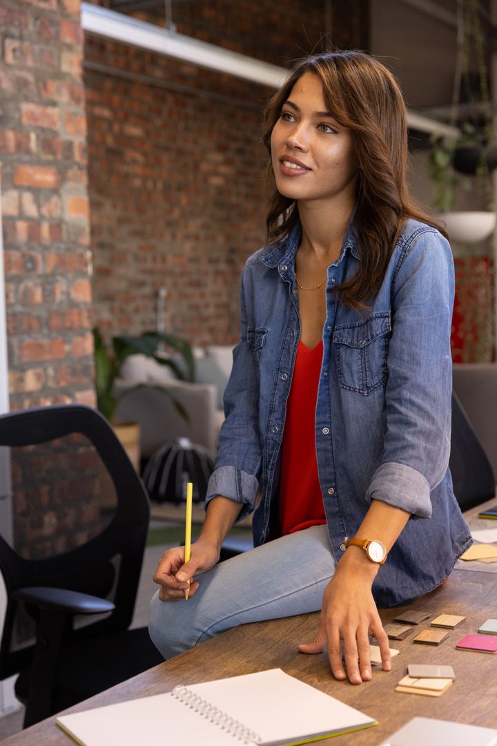 Creative Designer Thinking Ideas over Work Desk