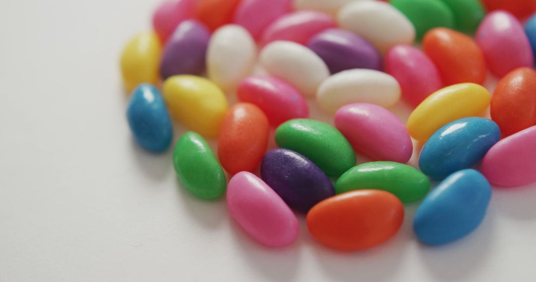 Close-Up of Colorful Candy Jelly Beans on White Background - Free Images, Stock Photos and Pictures on Pikwizard.com