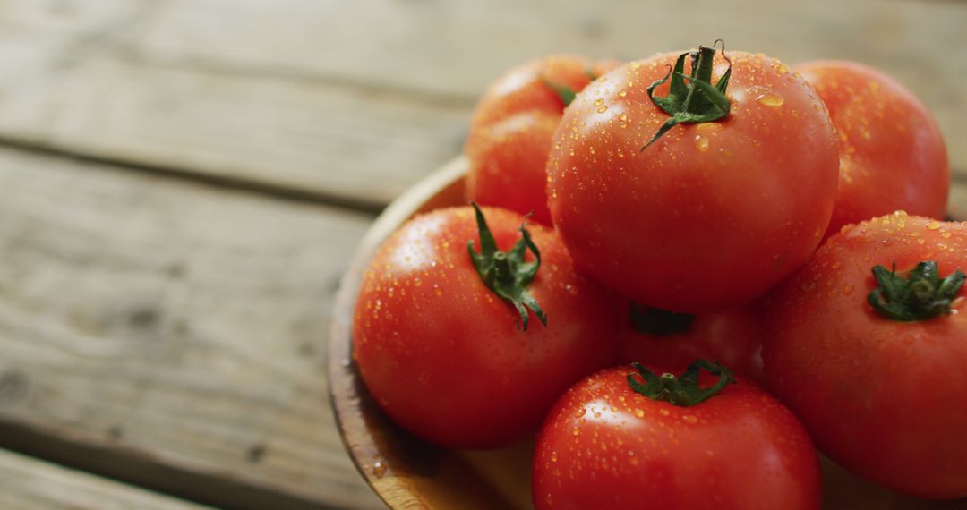 Fresh Red Tomatoes in Wooden Bowl with Water Droplets - Free Images, Stock Photos and Pictures on Pikwizard.com