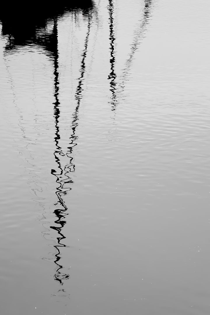 Abstract Black and White Reflection of Boat Mast on Water - Free Images, Stock Photos and Pictures on Pikwizard.com