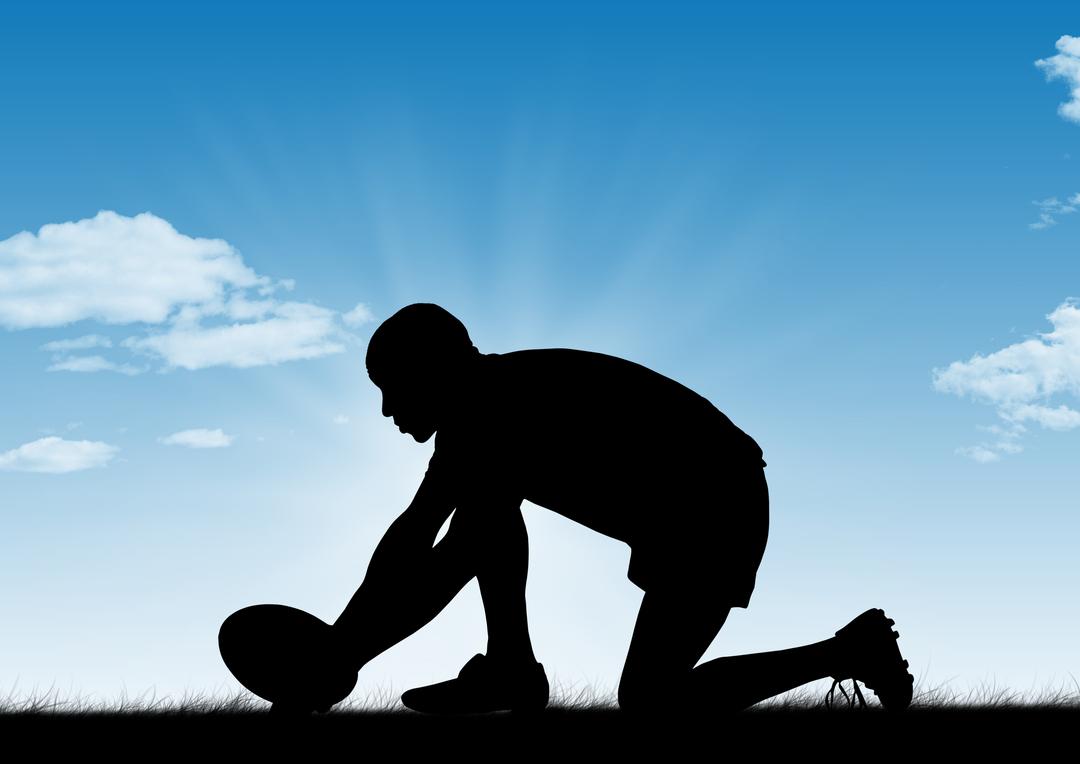 Silhouette of player holding a ball on ground against sky in background - Free Images, Stock Photos and Pictures on Pikwizard.com
