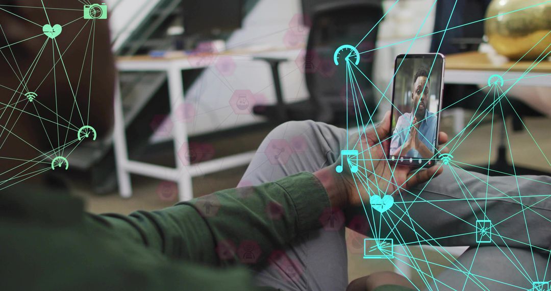 Person Watching Video Call on Smartphone with Digital Network Icons Overlay