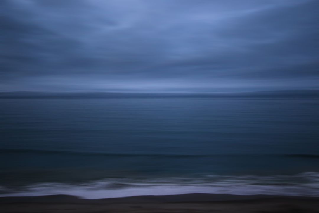Serene Dark Blue Seascape with Calm Horizon - Free Images, Stock Photos and Pictures on Pikwizard.com