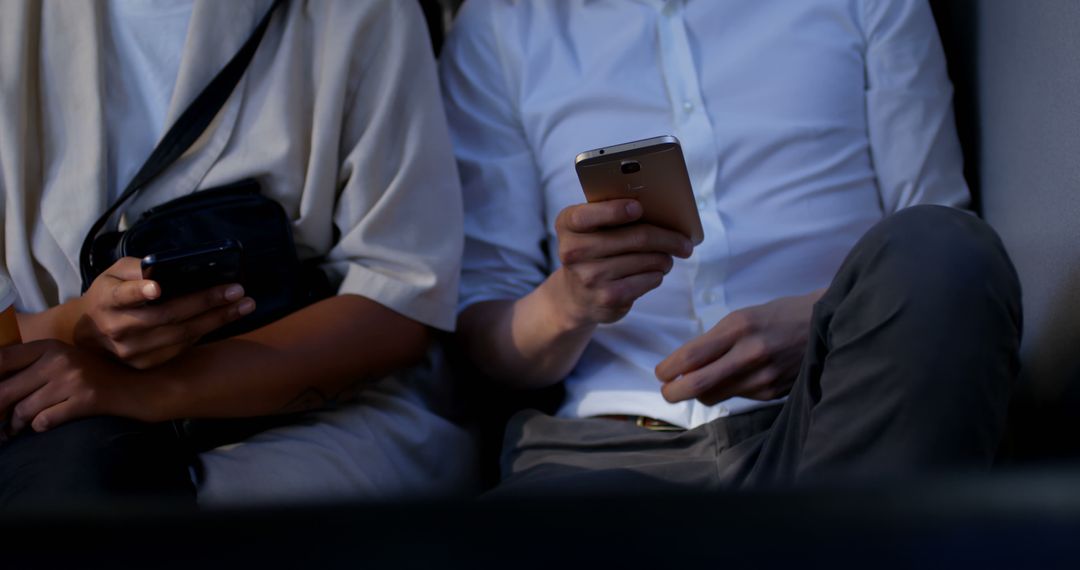 Close-up View of People Using Smartphones in Low Light - Free Images, Stock Photos and Pictures on Pikwizard.com