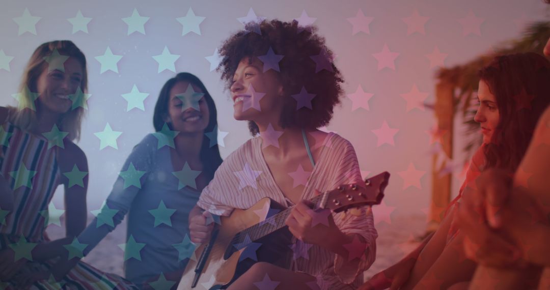 Women Celebrating with Guitar Under Starry Lights