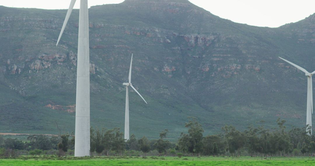 Wind Turbines in Mountainous Landscape - Free Images, Stock Photos and Pictures on Pikwizard.com