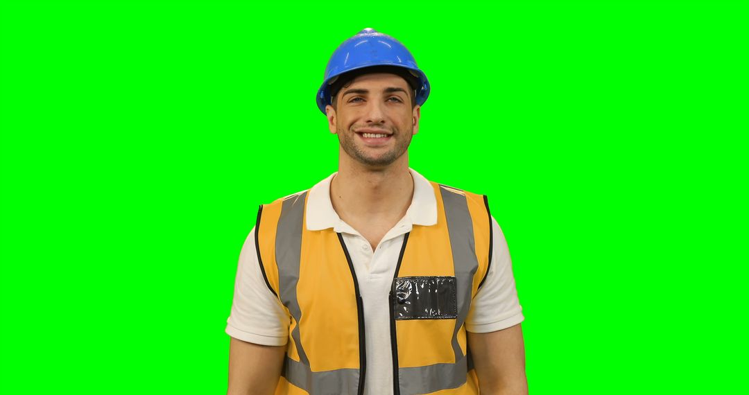 Architect in protective workwear using futuristic digital screen against green screen - Free Images, Stock Photos and Pictures on Pikwizard.com