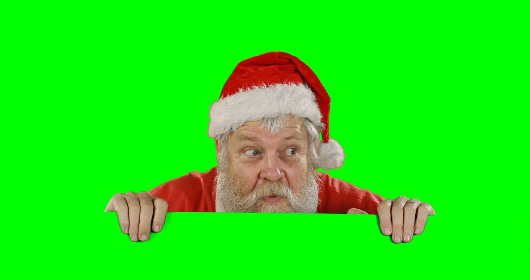 Santa Claus Peeking Behind Blank Space with Green Background - Free Images, Stock Photos and Pictures on Pikwizard.com