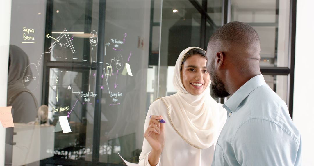 Diverse Colleagues Brainstorming Project in Modern Office