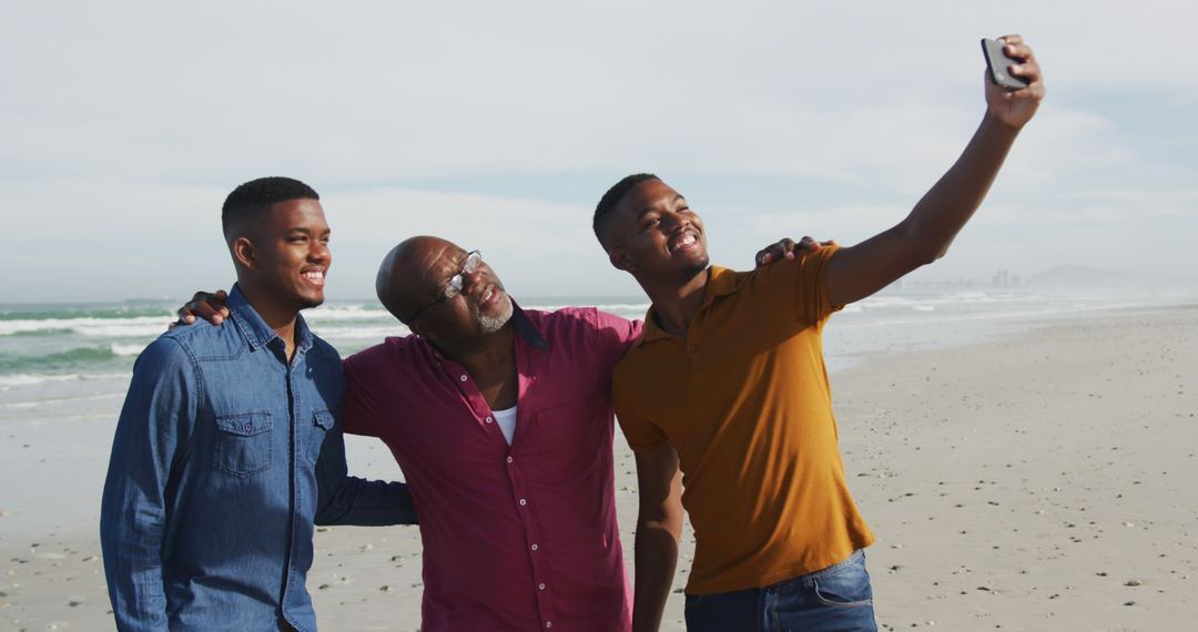 Happy Family Taking Selfie at Beach on Sunny Day - Free Images, Stock Photos and Pictures on Pikwizard.com