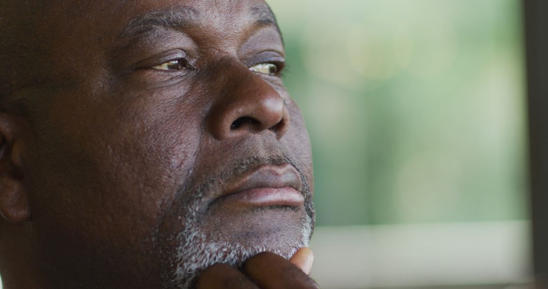 Thoughtful Elderly Man Looking Into Distance - Free Images, Stock Photos and Pictures on Pikwizard.com