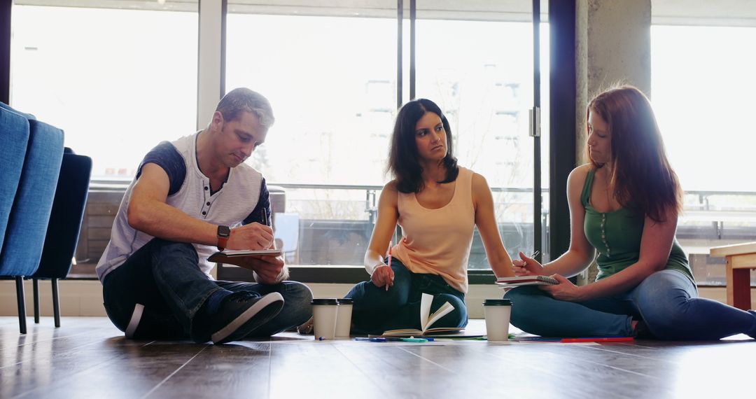 Casual Team Meeting with Diverse Colleagues Collaborating on Joint Project