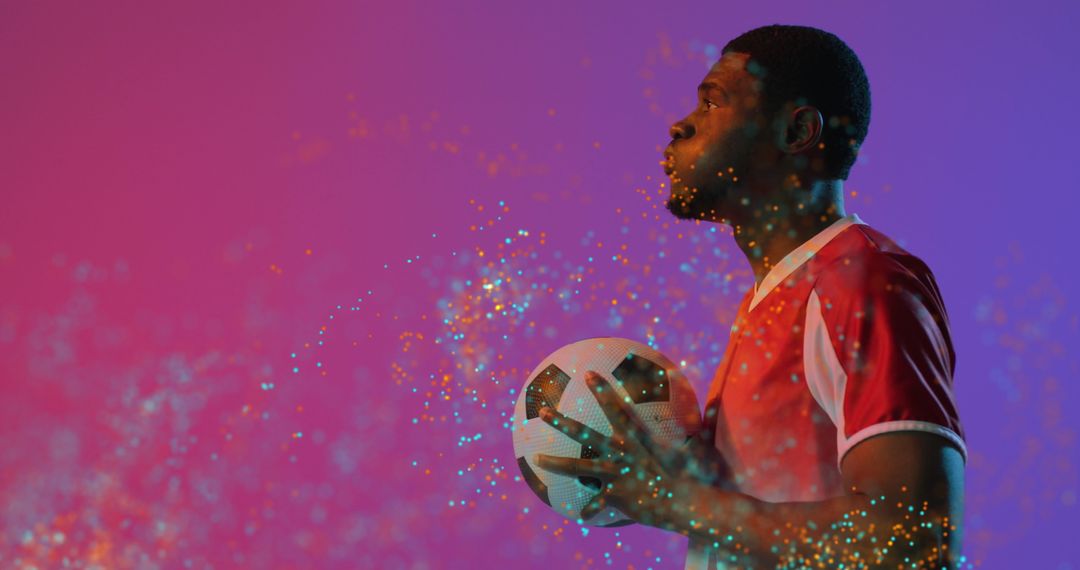 Dynamic Soccer Player Holding Ball with Digital Sparks