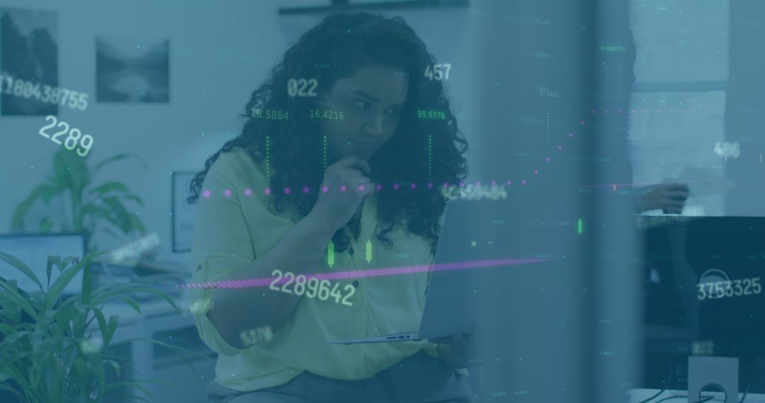 Diverse Professional Analyzing Data on Digital Tablet in Office