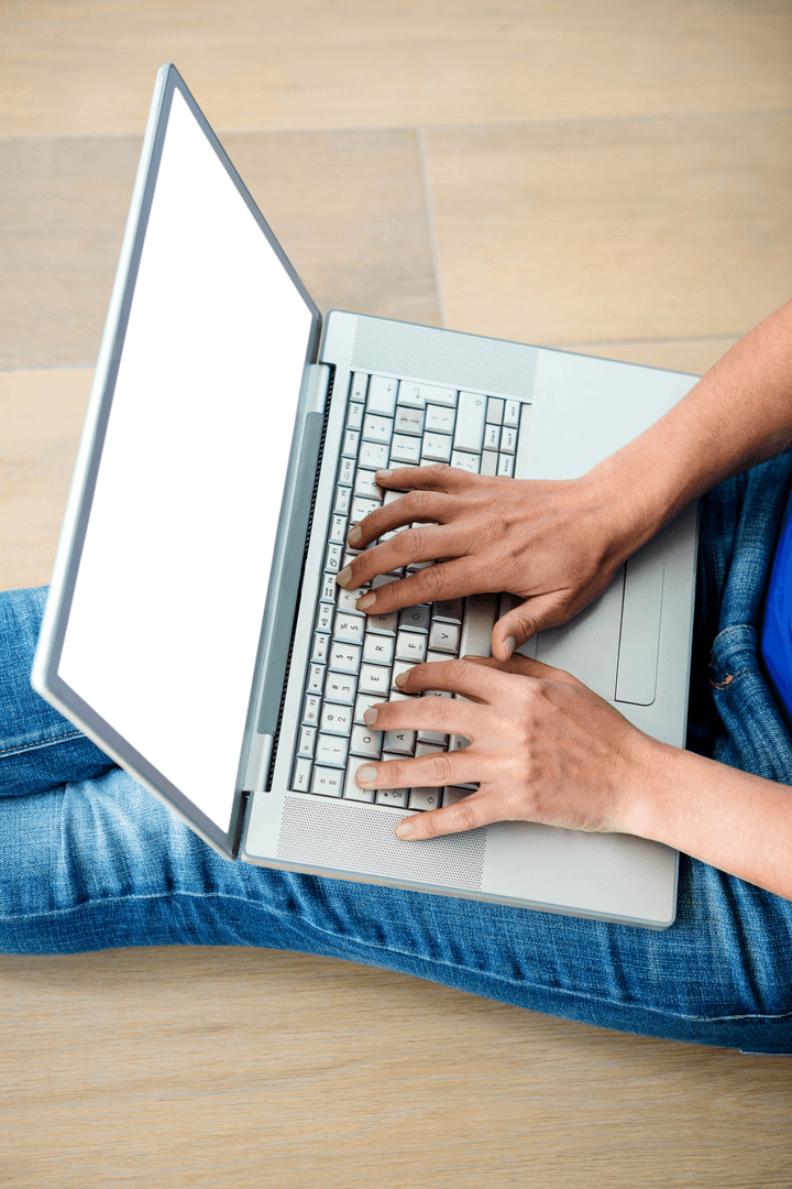 Transparent Screen of Laptop While Sitting on Floor