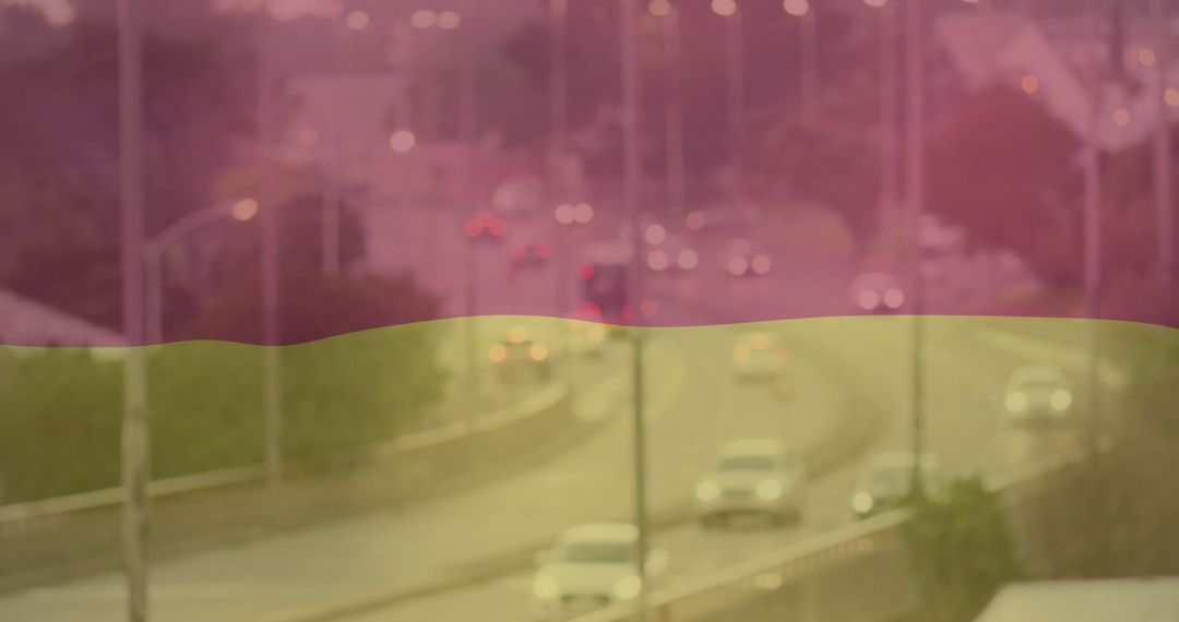 Urban highway with vehicles during rainy evening