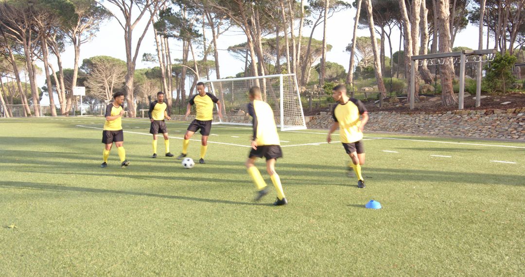 Youth Soccer Team Practicing Passing Skills on Sunny Field