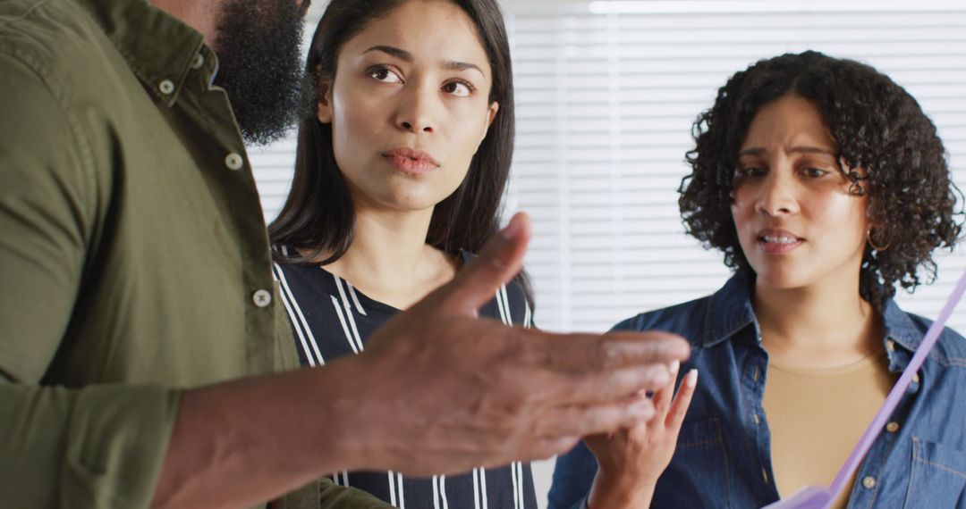 Diverse Team Discussing Project in Home Office