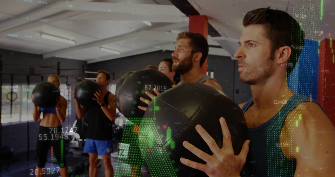 Multiracial Group Performing Medicine Ball Exercises in Gym