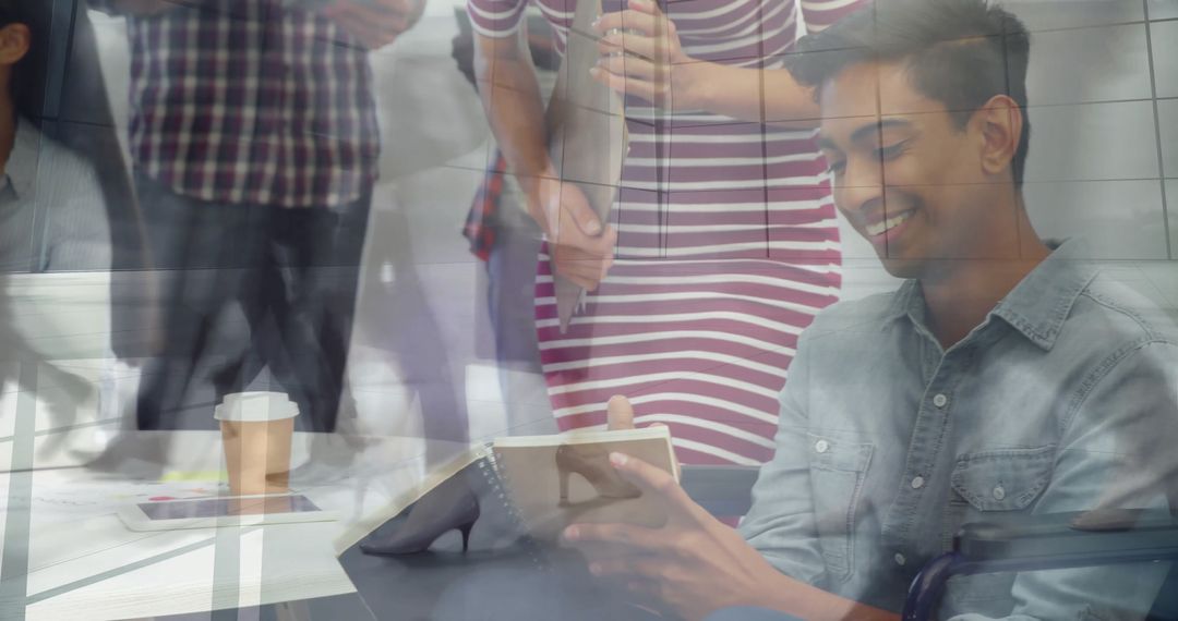 Young Professional Reviewing Notes in Modern Office Space