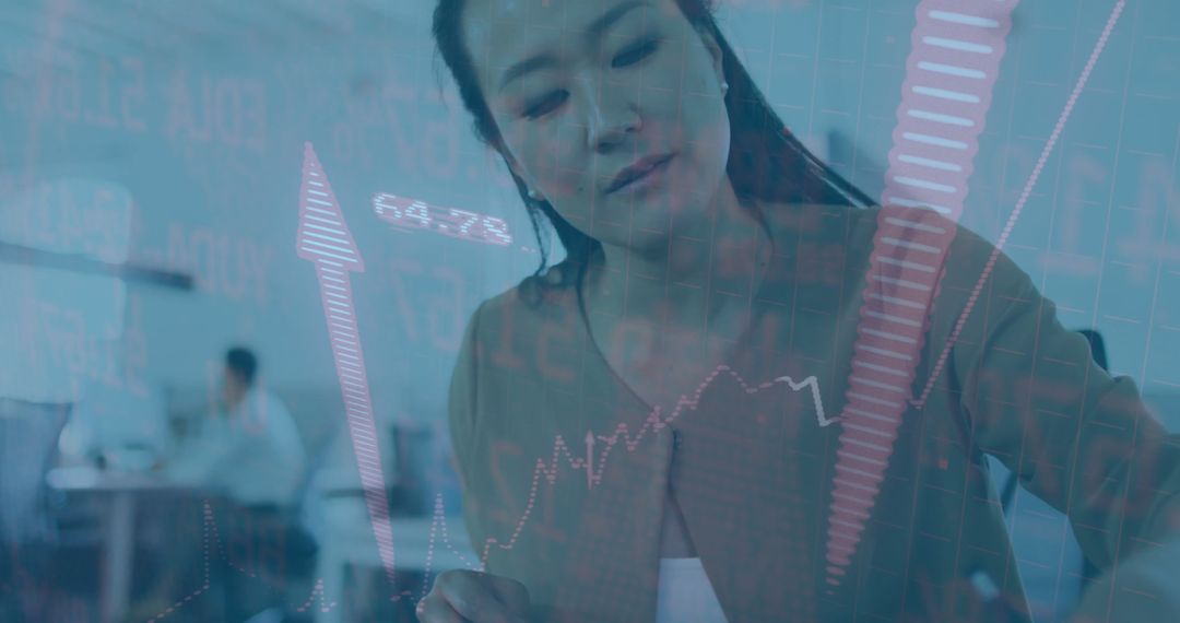 Entrepreneur Analyzing Financial Data with Digital Overlay in Modern Office