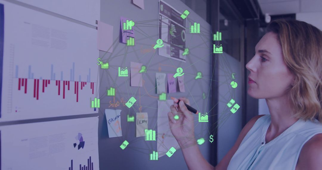 Focused Businesswoman Analyzing Data with Tech Icons Overlay