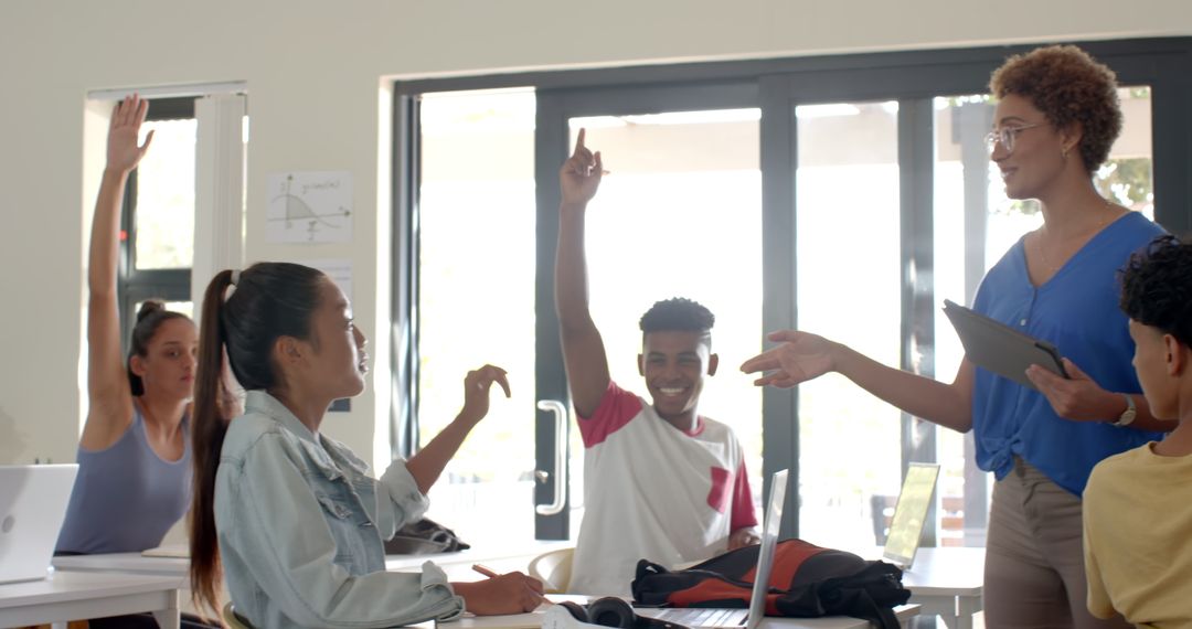 Teacher Encouraging Student Participation in Classroom Discussion