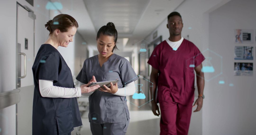 Healthcare Professionals Analyzing Data in Busy Hospital Corridor