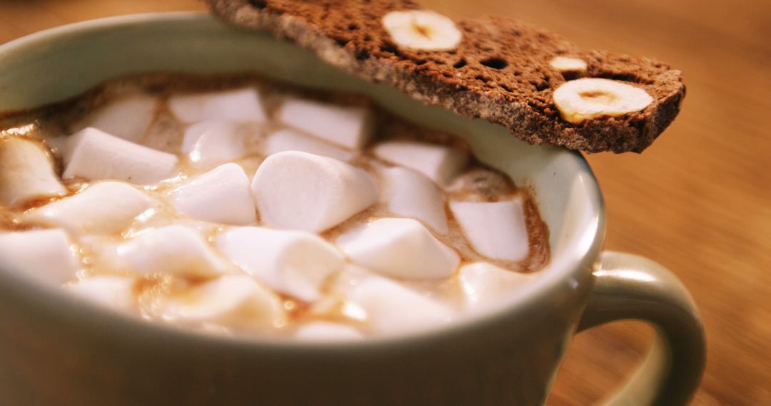 Close-Up of Hot Chocolate Mug with Marshmallows and Biscotti - Free Images, Stock Photos and Pictures on Pikwizard.com