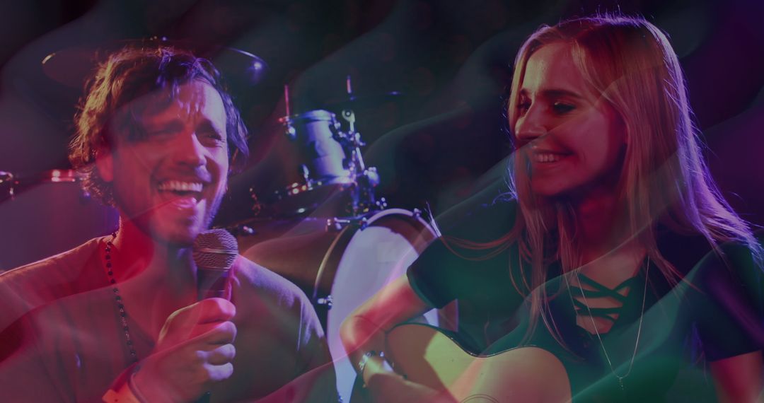 Dynamic Duo Performing Live Music with Vibrant Scenery