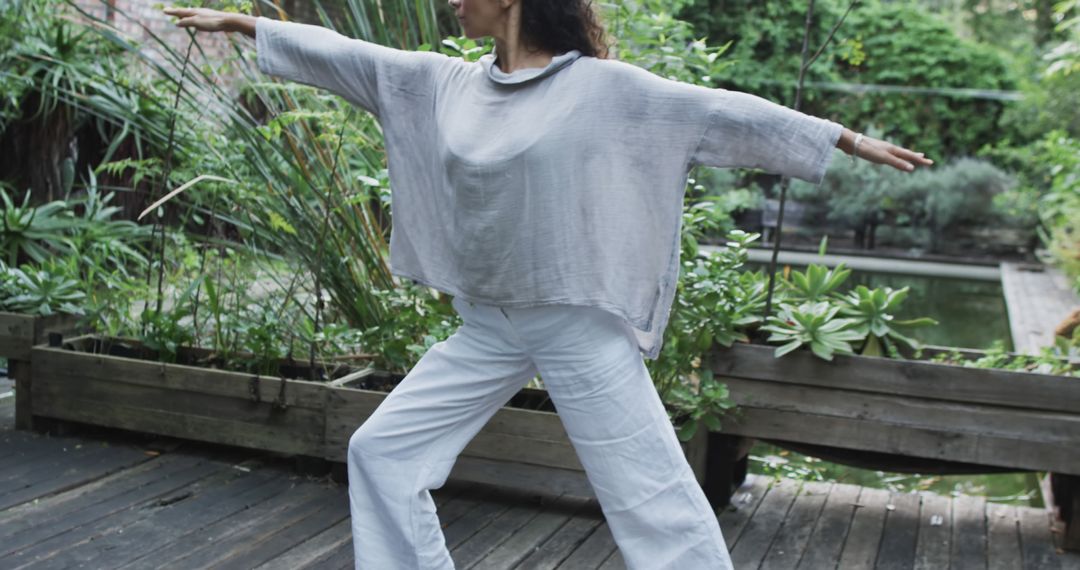 Woman Practicing Yoga in Serene Garden Environment - Free Images, Stock Photos and Pictures on Pikwizard.com