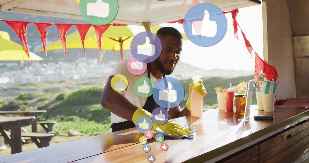 Man Cleaning Counter with Overlapping Thumbs-up Icons Represents Social Approval