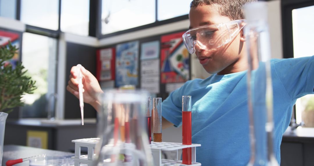 Focused Student Conducts Science Experiment in Classroom